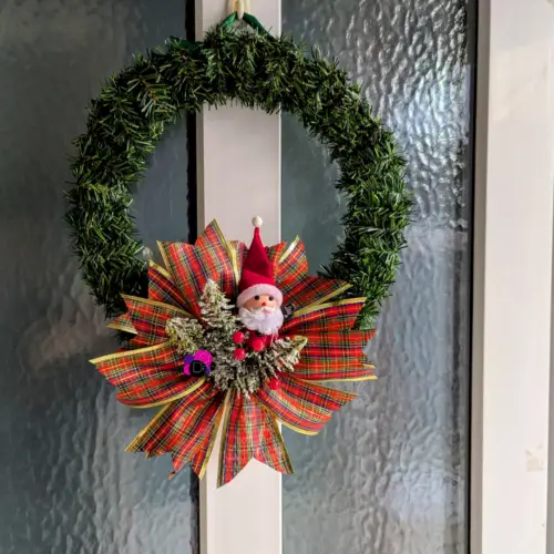 Greenery Wreath With Santa & Ribbon Detail